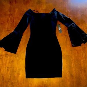 Lulu’s black cocktail dress size extra small. 3/4 length bell bottom sleeve.